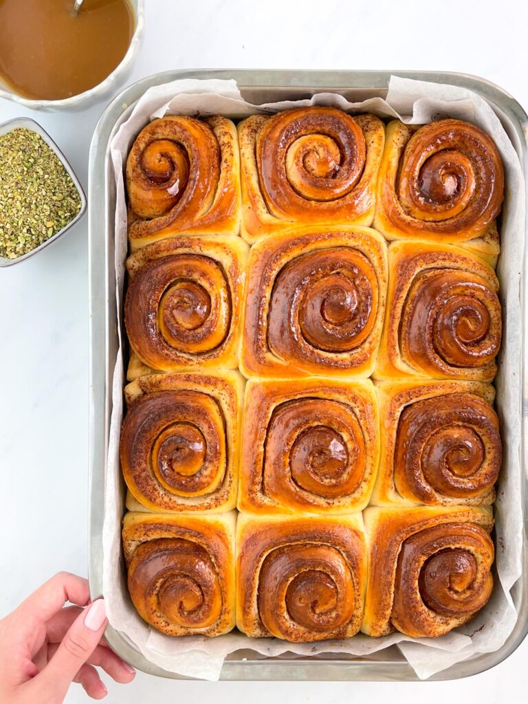 sourdough cinnamon rolls with caramel and pistachio