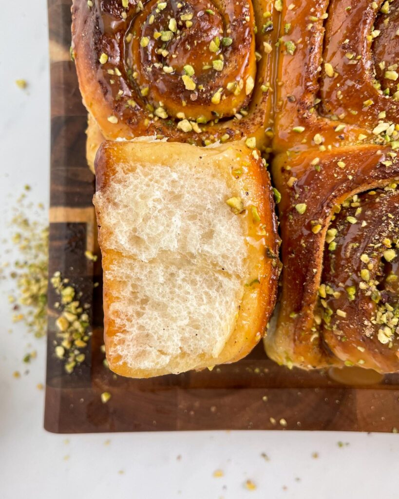 sourdough cinnamon rolls with caramel and pistachio